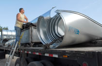 J&J Drainage Products trucks deliver end sections.